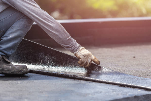 Professional Basement Waterproofing technician working in Chagrin Falls, OH
